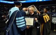 Howard P. Kern, president and chief executive officer of Sentara Healthcare, receives a Doctor of Humane Letters (honoris causa) degree from President Brian O. Hemphill, Ph.D. Photo Chuck Thomas/ODU